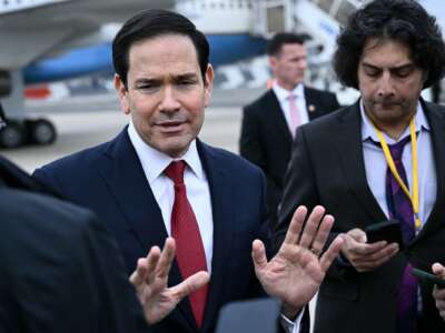 U.S. Secretary of State Marco Rubio gestures as he speaks to the press following a G7 Foreign Ministers' meeting with partner countries before his departure at the Bourget airport in Le Bourget, outside Paris, on March 27, 2026.