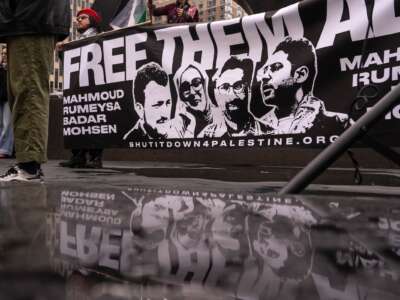 Pro-Palestinian activists rally for Mohsen Mahdawi, Mahmoud Khalil, Rümeysa Öztürk, and others, and protest against deportations outside of ICE Headquarters on April 15, 2025 in New York City.