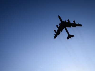 A United States Air Force B-52 Stratofortress strategic bomber is seen in the sky after taking off from RAF Fairford on March 19, 2026 in Fairford, England. Since UK Prime Minister Keir Starmer back-tracked on his initial refusal to allow the U.S. to use British bases to launch defensive strikes against Iranian missile sites, a variety of U.S. military aircraft, including B52 and B-1 bombers, have been spotted at RAF Fairford in Gloucestershire.