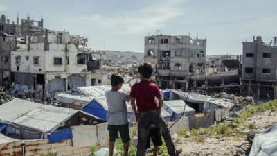 Children stand in the midst of destruction in Jabalia camp in northern Gaza on April 24, 2026. Residents continued to live in the area near the Israeli military’s “yellow line” amid ongoing operations and widespread damage.