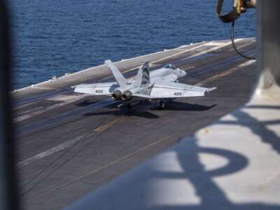 An F/A-18E Super Hornet, attached to Strike Fighter Squadron (VFA) 151, makes an arrested landing on the flight deck of Nimitz-class aircraft carrier USS Abraham Lincoln (CVN 72) in support of Operation Epic Fury, March 6, 2026.