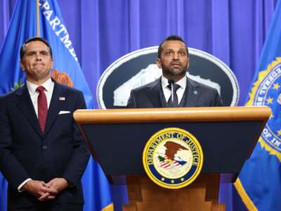 FBI Director Kash Patel speaks as Acting Attorney General Todd Blanche listens at a press conference on April 28, 2026 at the Department of Justice in Washington, D.C.
