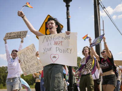 Saturn Ferguson joins students protesting against Katy ISD's new transgender policy outside the school districts educational support complex on August 30, 2023, in Katy, Texas.
