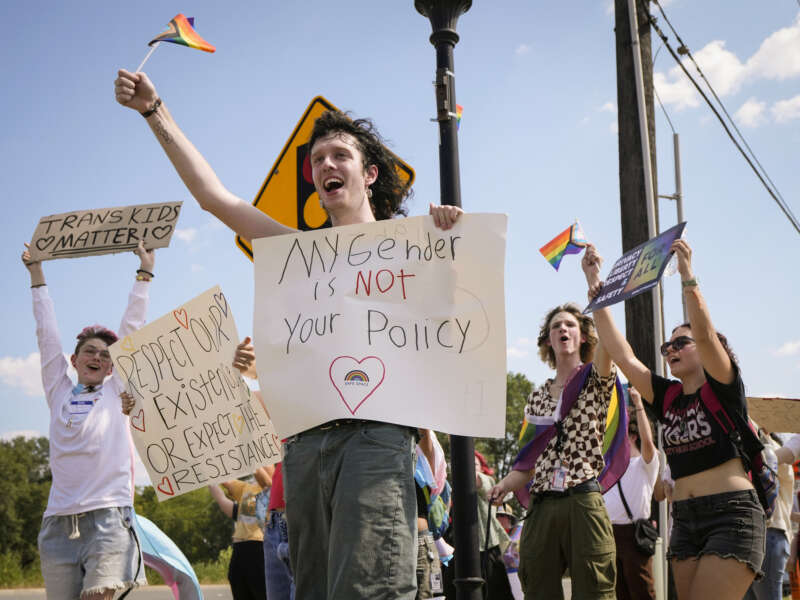 Saturn Ferguson joins students protesting against Katy ISD's new transgender policy outside the school districts educational support complex on August 30, 2023, in Katy, Texas.
