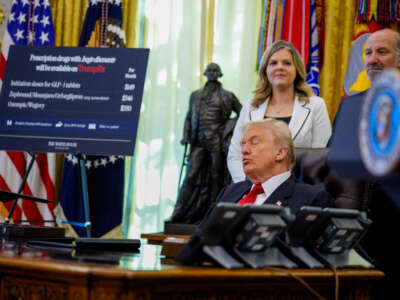 President Donald Trump appears at an event on lowering drug prices in the Oval Office at the White House on November 6, 2025, in Washington, D.C.