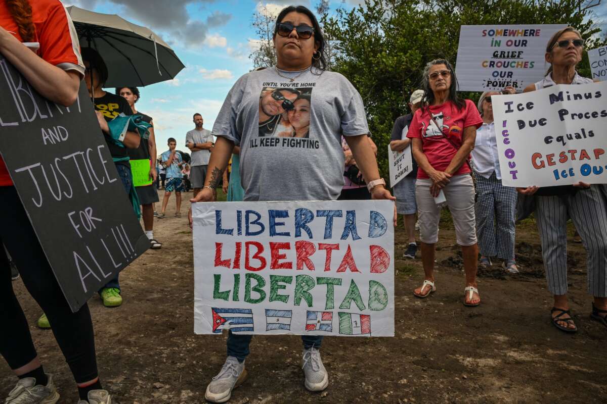 Demonstrators protest against Immigration and Customs Enforcement (ICE) and demanding the closure of the immigrant detention center known as "Alligator Alcatraz" outside the center at the Dade-Collier Training and Transition Airport in Ochopee, Florida, on January 11, 2026.