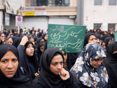 Women gather as funerals are held for students and staff who were killed in a U.S.-Israeli strike on a girls' school on February 28, on March 3, 2026, in Minab, Iran.