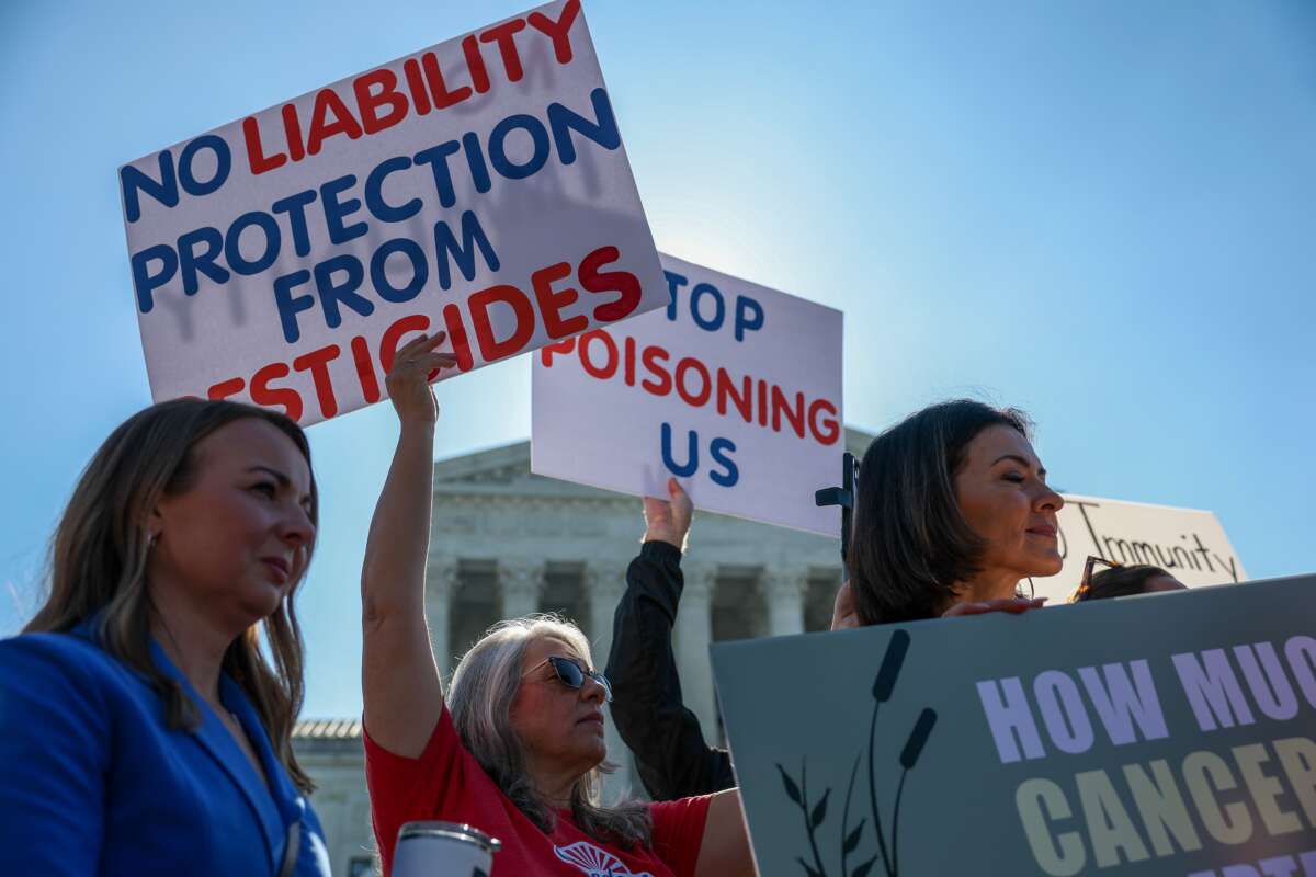 Protesters gather at the Supreme Court, which was set to hear arguments in a case that could lead to the dismissal of tens of thousands of lawsuits against Bayer that claim the weedkiller Roundup, made by Monsanto, caused non-Hodgkin lymphoma, on April 27, 2026, in Washington, D.C.