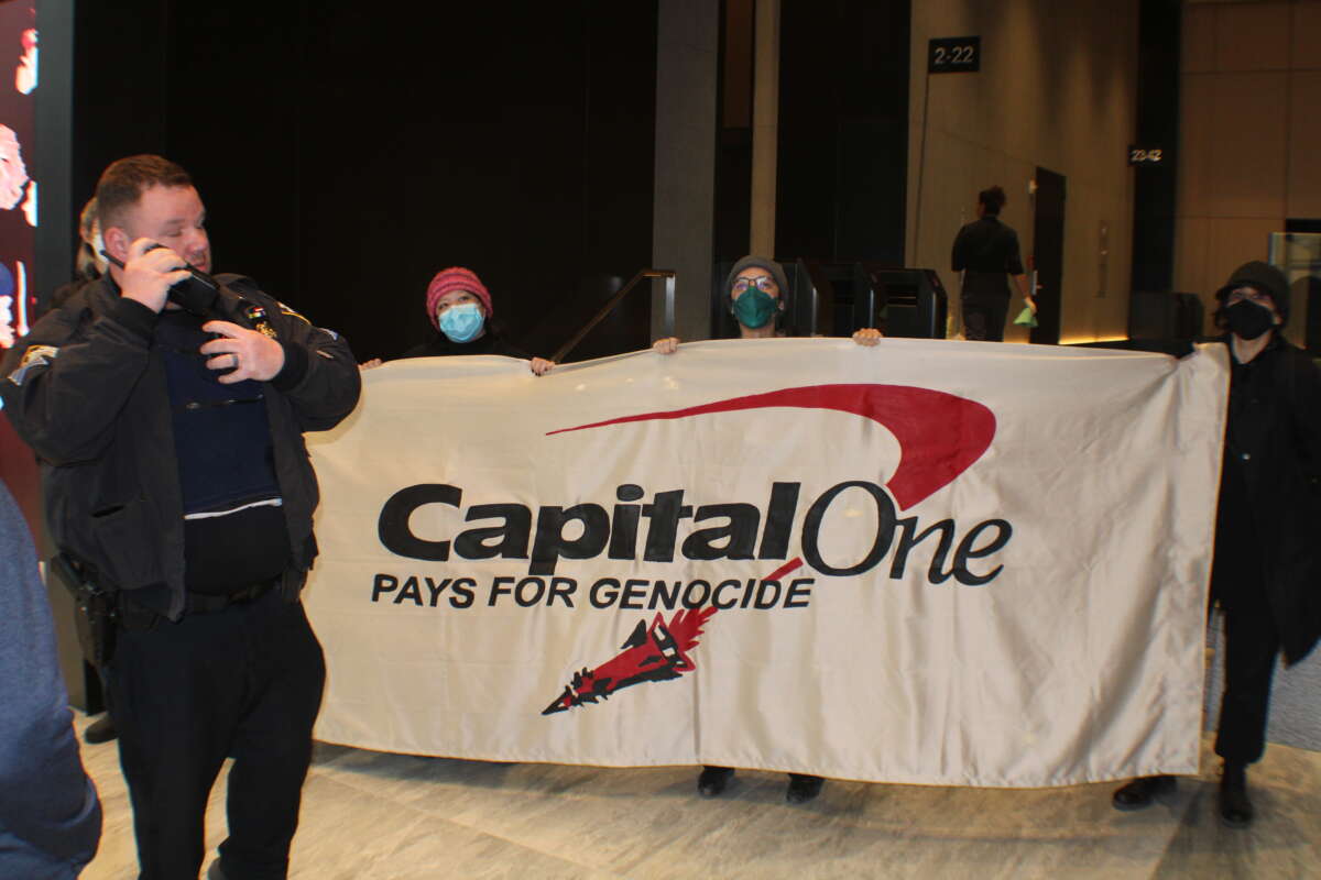 On April 21, 2026, police and private security responded aggressively to Demilitarize Brooklyn Navy Yard’s protest inside of Capital One’s Midtown Manhattan offices.
