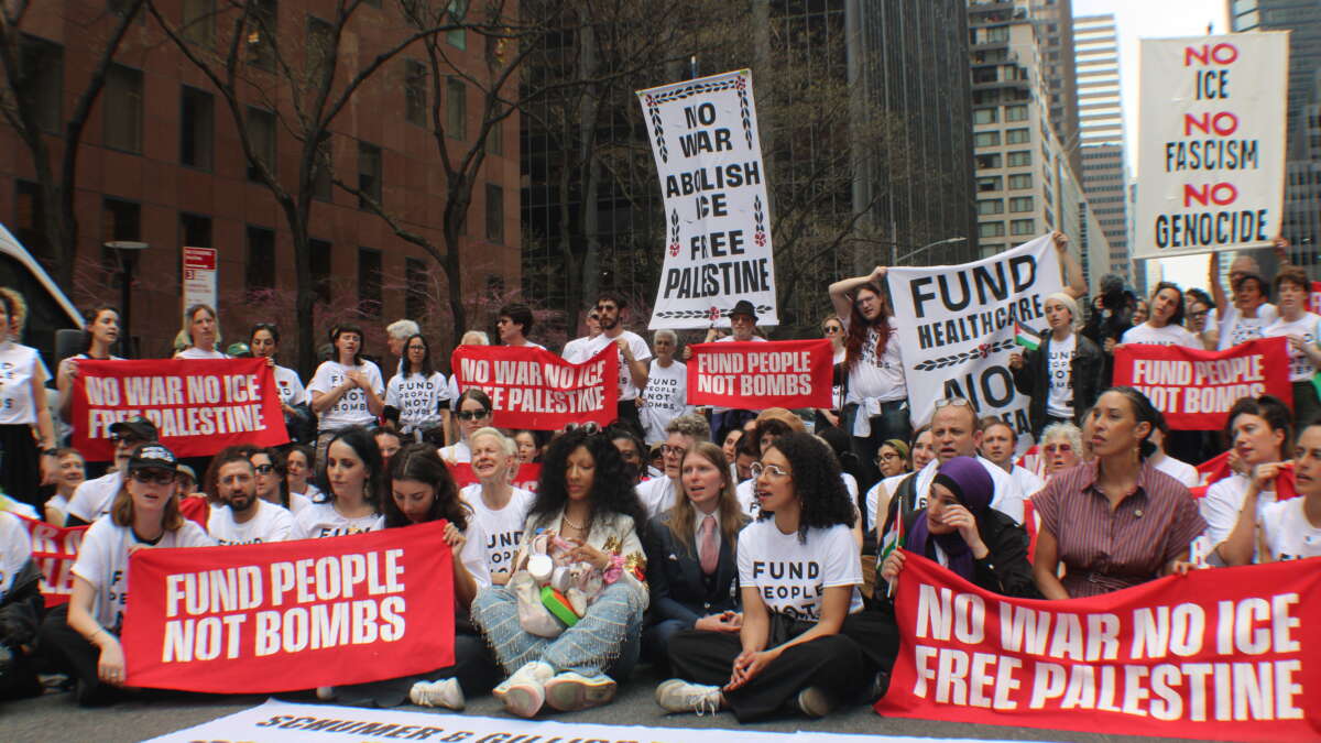 About 150 protesters block Third Avenue in Manhattan in front of the offices of Senators Chuck Schumer and Kirsten Gillibrand on April 13, 2026.