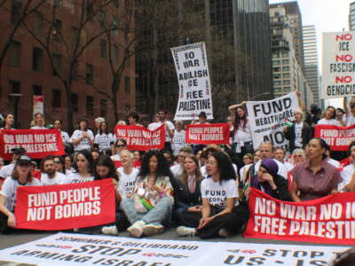 About 150 protesters block Third Avenue in Manhattan in front of the offices of Senators Chuck Schumer and Kirsten Gillibrand on April 13, 2026.