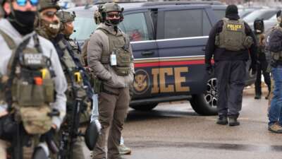 US Homeland Security Investigations agents stand guard in Minneapolis, Minnesota, on January 8, 2026, a day after an ICE agent killed Renee Good.