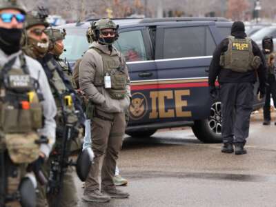 US Homeland Security Investigations agents stand guard in Minneapolis, Minnesota, on January 8, 2026, a day after an ICE agent killed Renee Good.