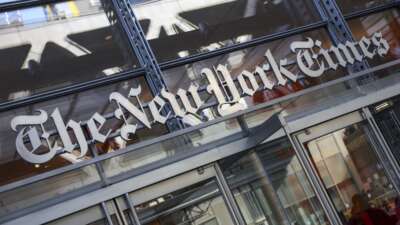 The New York Times logo is seen on the building's facade in New York City on January 22, 2026.
