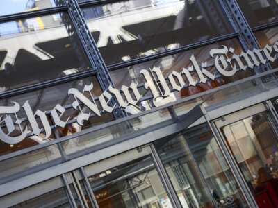 The New York Times logo is seen on the building's facade in New York City on January 22, 2026.