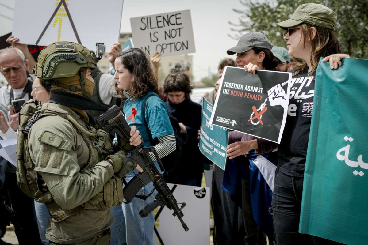 Israeli and Palestinian activists protest against the new death penalty law, approved earlier this week by the Knesset, on April 3, 2026 in Beit Jala, in the occupied West Bank.