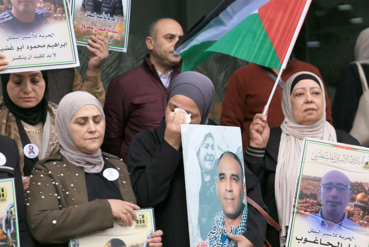 A Palestinian woman cries during a sit-in protest demanding the release of detained prisoners in Israeli prisons, in Nablus in the occupied West Bank, on May 5, 2026.