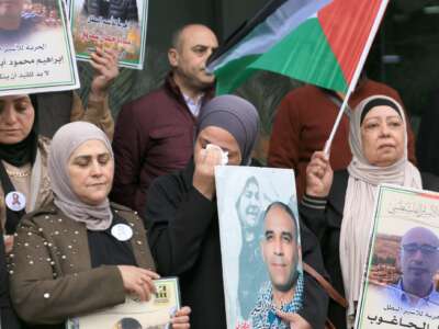 A Palestinian woman cries during a sit-in protest demanding the release of detained prisoners in Israeli prisons, in Nablus in the occupied West Bank, on May 5, 2026.
