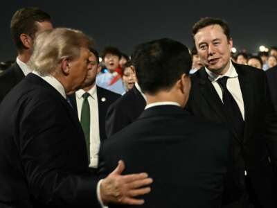 US President Donald Trump presents SpaceX, Twitter and Tesla CEO Elon Musk to China’s Vice President Han Zheng at Beijing Capital Airport on May 13, 2026.