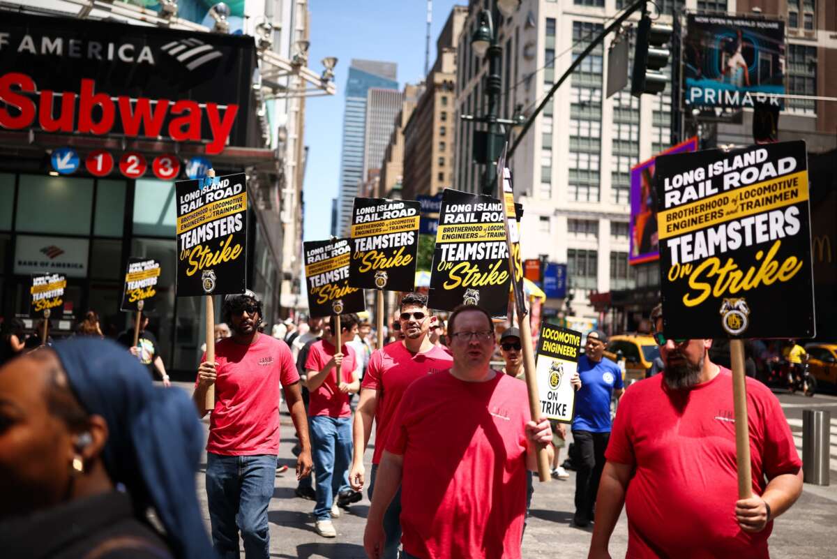 Long Island Rail Road (LIRR) workers picket in front of Penn Station in New York City on May 17, 2026. LIRR workers went on strike on May 16 after failing to reach a new contract with the Metropolitan Transportation Authority.