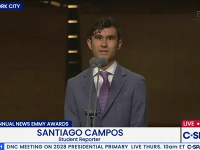 Santiango Santos gives an acceptance speech after receiving the Mark Wallace Memorial Scholarship at the 47th Annual Emmy Awards in New York on May 27, 2026.