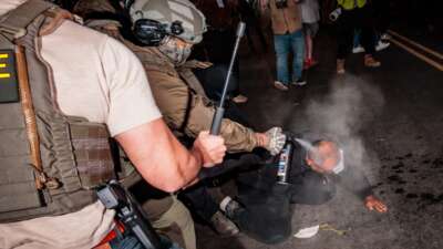 ICE agents spray a protestor with a chemical irritant before detaining them outside of the federal immigration center at Delaney Hall, where ICE is housing detained immigrants, on May 28, 2026 in Newark, New Jersey.
