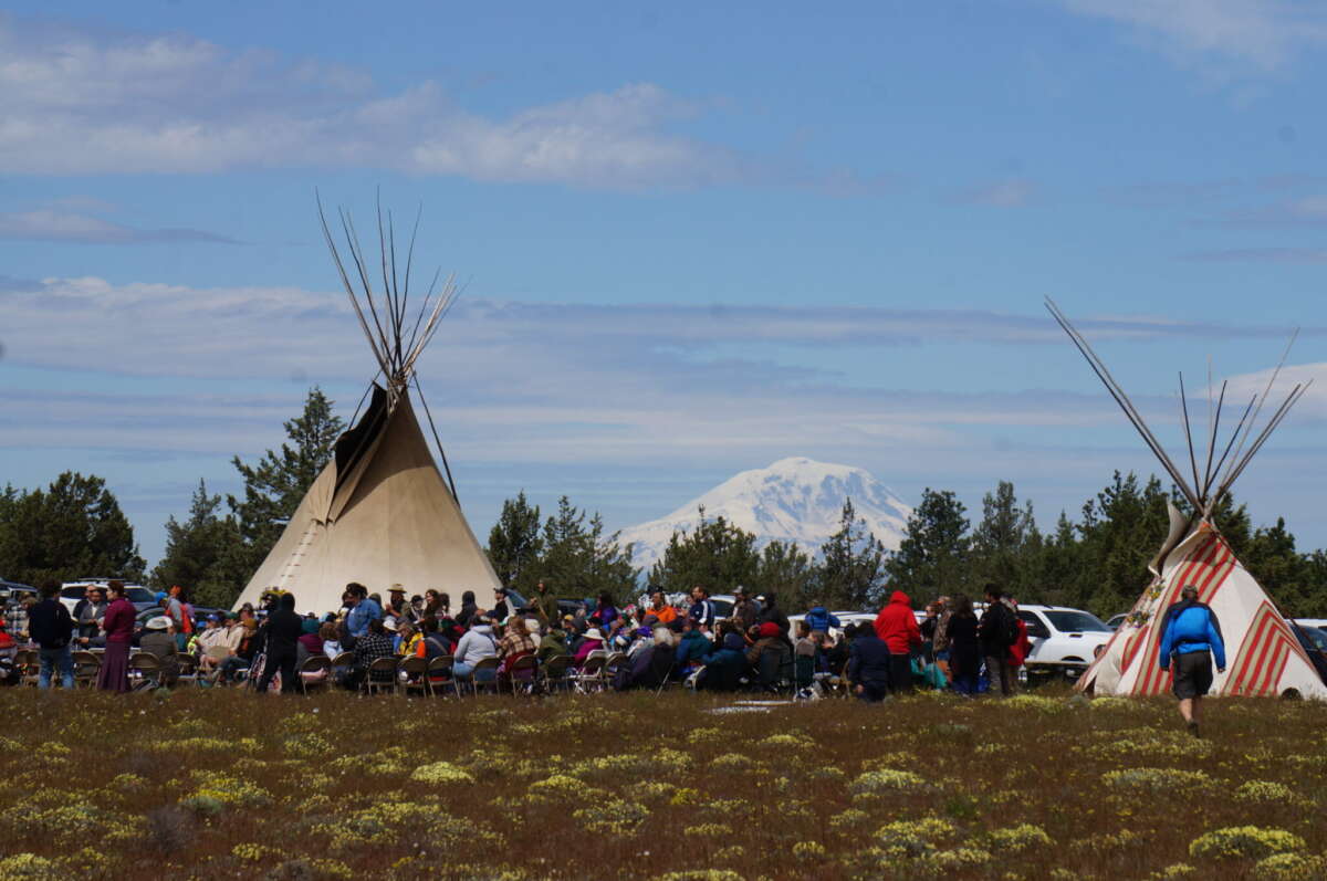 People gather near Pushpum, a site sacred to Columbia River tribes near Goldendale, Washington, on May 8, 2026.