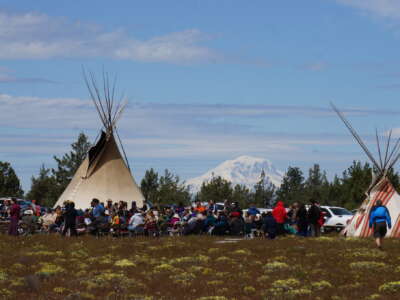 People gather near Pushpum, a site sacred to Columbia River tribes near Goldendale, Washington, on May 8, 2026.