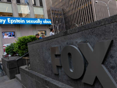 The latest news is displayed outside of the News Corporation building in midtown Manhattan, which houses both the Wall Street Journal, Fox News, and Dow Jones Co., on July 22, 2025, in New York City.