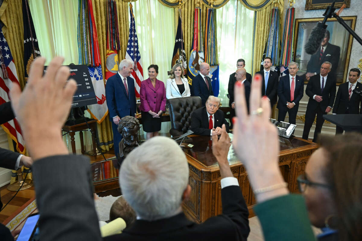 U.S. President Donald Trump takes questions from reporters during an event about weight-loss drugs in the Oval Office of the White House in Washington, D.C., on November 6, 2025.