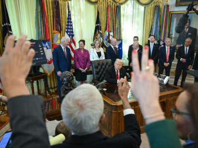 U.S. President Donald Trump takes questions from reporters during an event about weight-loss drugs in the Oval Office of the White House in Washington, D.C., on November 6, 2025.
