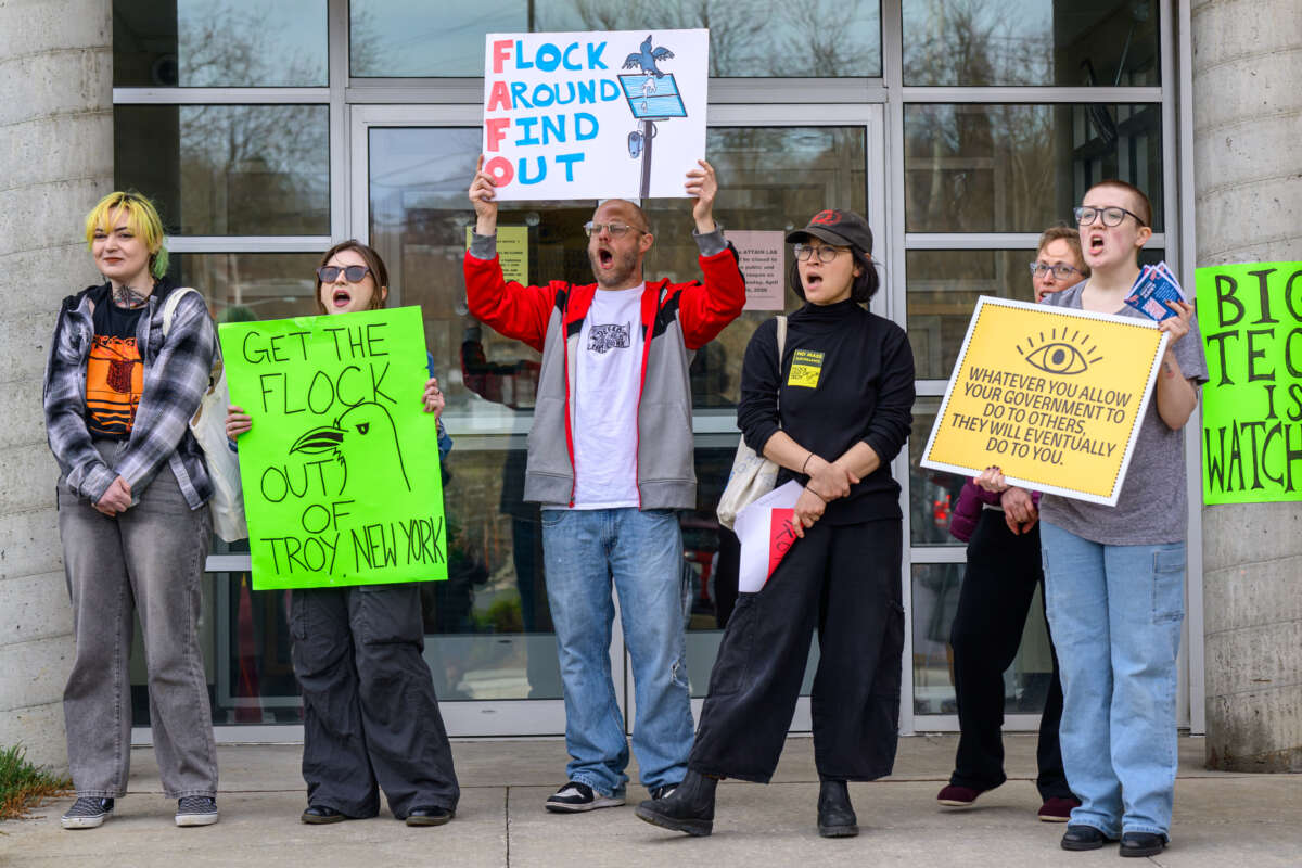 Protesters rally against the use of Flock cameras on April 3, 2026, outside City Hall in Troy, NY.