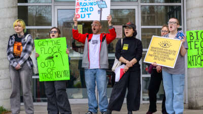 Protesters rally against the use of Flock cameras on April 3, 2026, outside City Hall in Troy, NY.