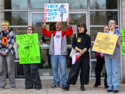 Protesters rally against the use of Flock cameras on April 3, 2026, outside City Hall in Troy, NY.