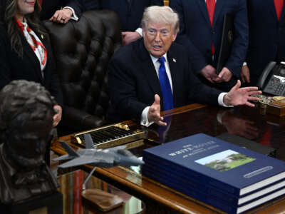President Donald Trump speaks after signing several executive orders in the Oval Office of the White House in Washington, DC, on April 30, 2026.