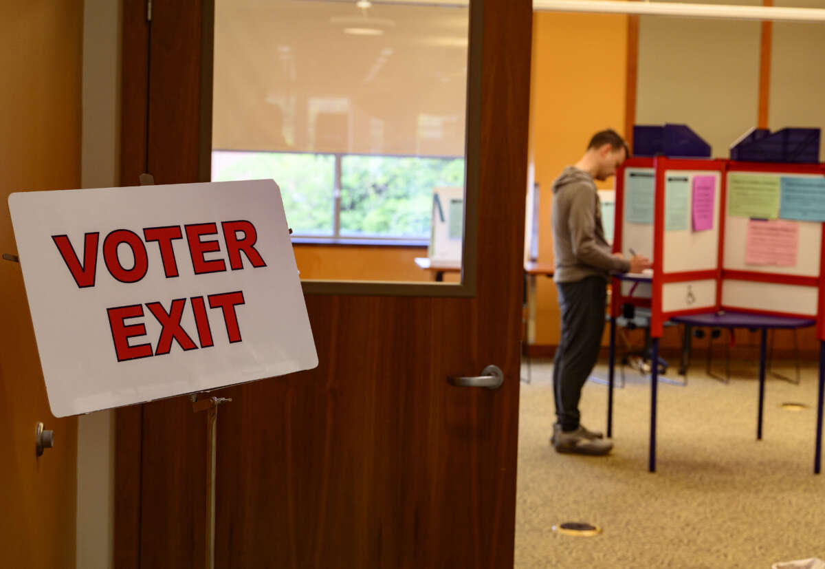 A voter casts his ballot at the Kent Free Library during the Ohio primaries on May 5, 2026, in Kent, Ohio.