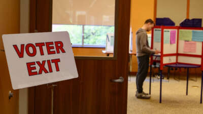 A voter casts his ballot at the Kent Free Library during the Ohio primaries on May 5, 2026, in Kent, Ohio.
