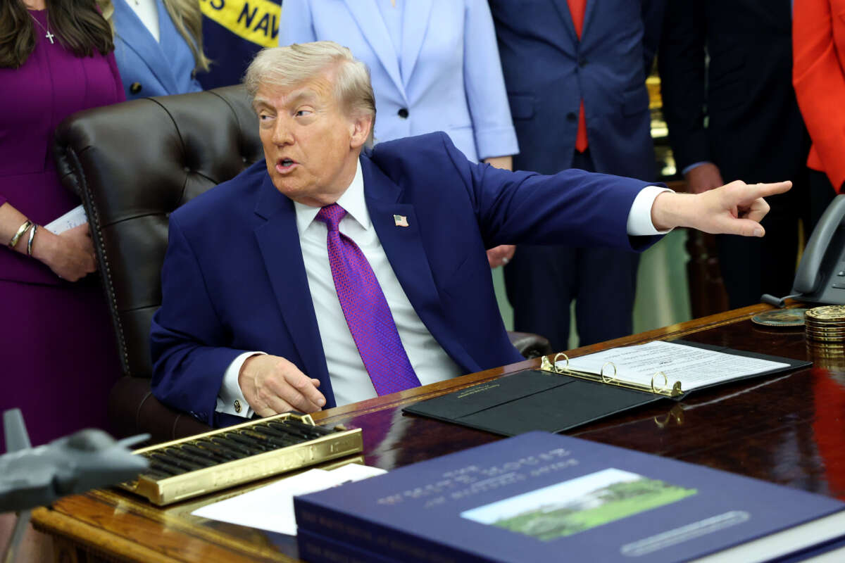President Donald Trump points out a member of the press during an event on maternal healthcare in the Oval Office of the White House on May 11, 2026, in Washington, D.C.