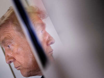 U.S. President Donald Trump speaks to reporters aboard Air Force One after his departure from Beijing Capital Airport in Beijing, China, on May 15, 2026, on his way back to the United States.