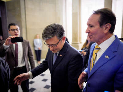 House Speaker Mike Johnson and Louisiana Gov. Jeff Landry (right) walk off the House floor of the U.S. Capitol Building on May 21, 2026, in Washington, D.C.