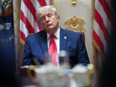U.S. President Donald Trump listens to members of his Cabinet speak during a meeting in the Cabinet Room of the White House on May 27, 2026, in Washington, D.C.