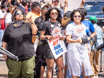 Protestors march in Selma, Alabama, as part of the All Roads Lead to the South rally on May 16, 2026. A three-judge federal panel Tuesday blocked Alabama's use of a congressional map it had previously ruled racially discriminatory.