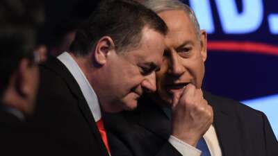 Israeli Prime Minister Benjamin Netanyahu speaks with Israel Katz, then Israel's Minister of Foreign Affairs, on February 29, 2020. Today, Katz is Israel's Minister of Defense.