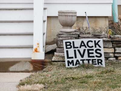 A Black Lives Matter sign sits in a front yard of a house in Evanston, Illinois, on March 16, 2021. The suburb in Chicago became the first place in the US to provide reparations to its Black residents for housing discrimination.
