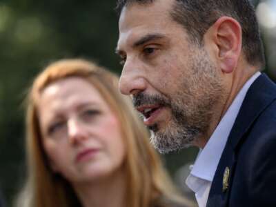 Nurse Monica Johnston (L) listens as Adam Hamawy speaks during an interview before a meeting at the White House in Washington DC, on June 14, 2024.