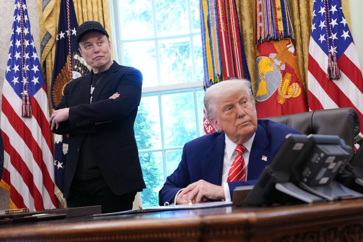Tesla CEO Elon Musk and President Donald Trump listen to a question from reporters in the Oval Office of the White House on May 30, 2025 in Washington, DC.