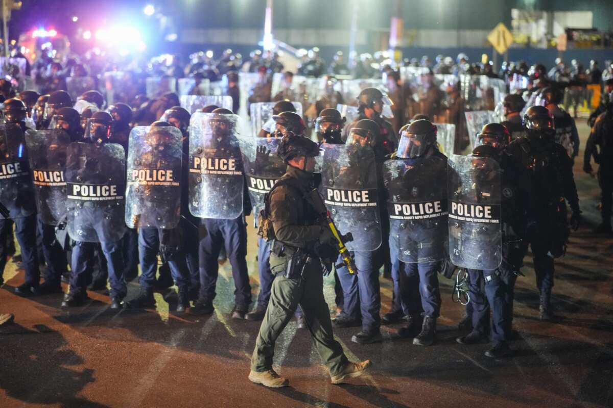 New Jersey state police mobilize to enforce curfew near Delaney Hall, which is being used as an Immigration and Customs Enforcement (ICE) detention center, in Newark, New Jersey, on May 31, 2026. Police soon surrounded and arrested dozens of protesters.
