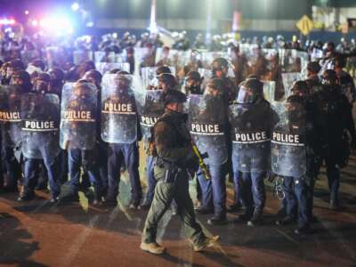 New Jersey state police mobilize to enforce curfew near Delaney Hall, which is being used as an Immigration and Customs Enforcement (ICE) detention center, in Newark, New Jersey, on May 31, 2026. Police soon surrounded and arrested dozens of protesters.