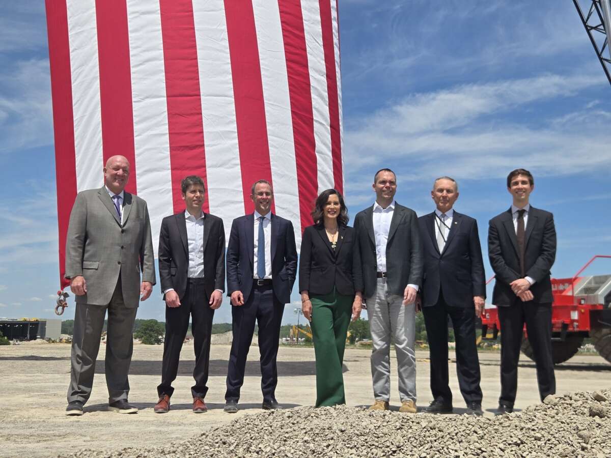 Michigan Democratic Governor Whitmer stands with tech CEOs, including OpenAI CEO Sam Altman, in a groundbreaking ceremony for a controversial data center in Saline Township, Michigan, on June 1, 2026.