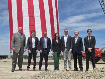 Michigan Democratic Governor Whitmer stands with tech CEOs including OpenAI CEO Sam Altman in groundbreaking ceremony for controversial data center in Saline Township, Michigan.